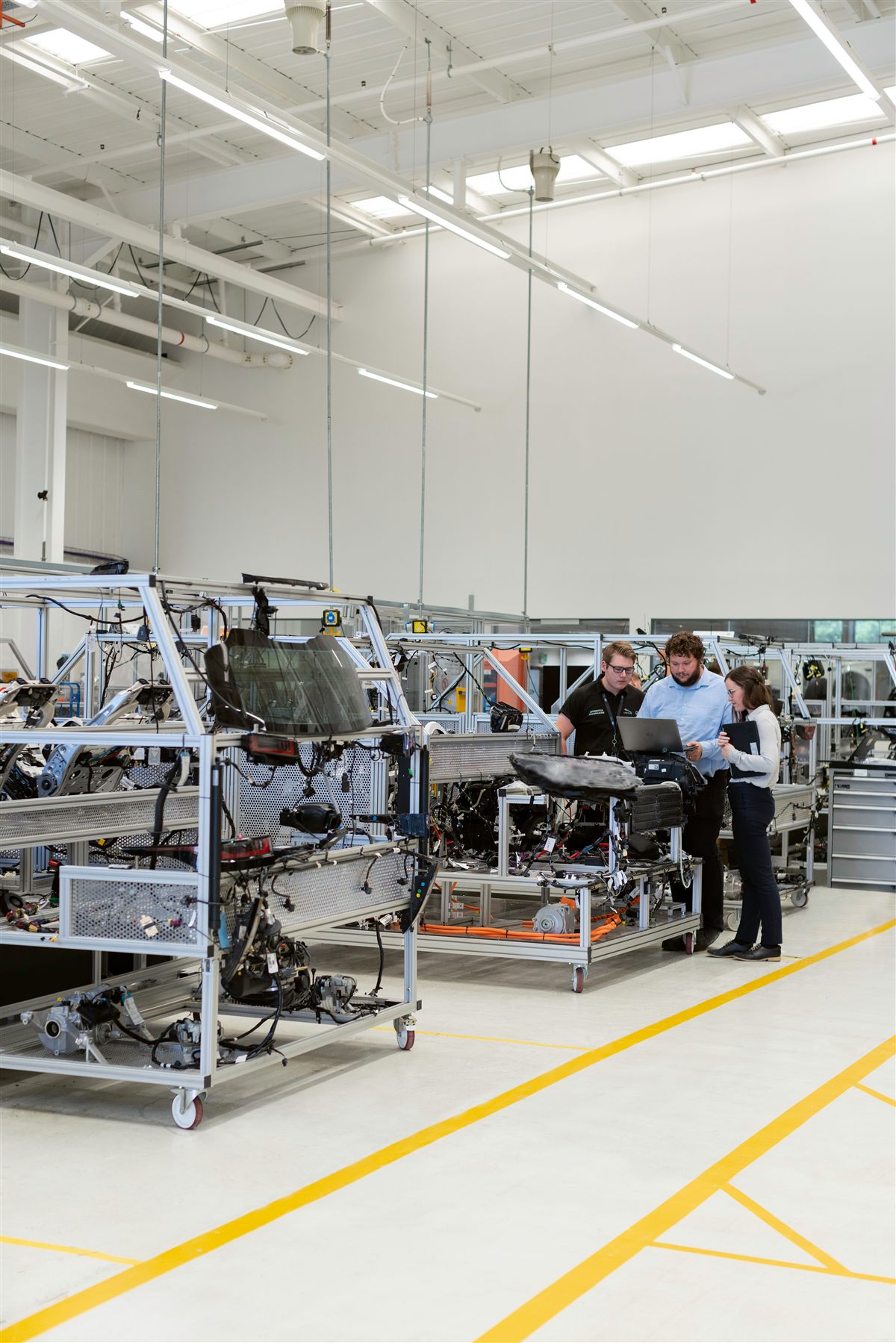 Engineering team collaborating in a manufacturing environment